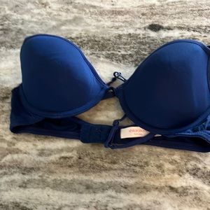A woman’s blue bra